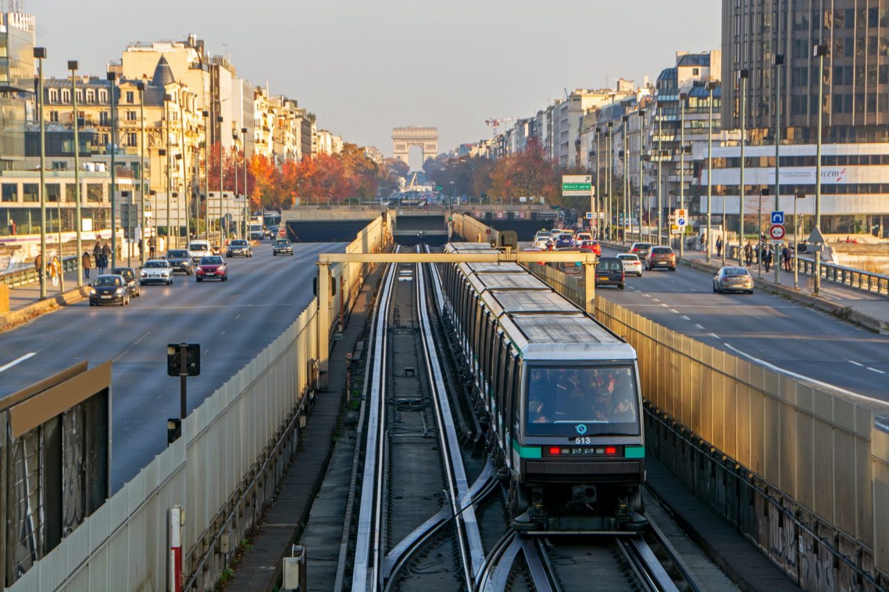 Metro train moving towards the Arc de Triomphe